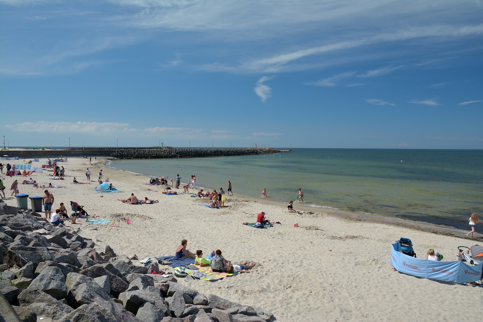 Foto av Plaza Centralna med ljus fin sand yta