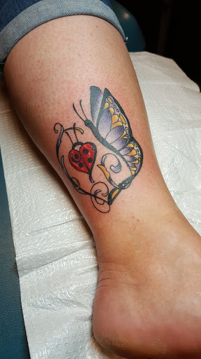 Explore singing tattoo ideas, creative tattoo ideas in Oshkosh, available at Big Guns Tattoo Oshkosh