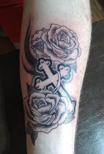 Explore wedding ring tattoo cover up ideas, creative tattoo ideas in Park Hills, available at Body Designs Tattoo & Piercing