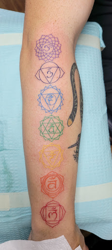 Explore forearm name tattoo ideas, creative tattoo ideas in Orlando, available at Cast Iron Tattoos