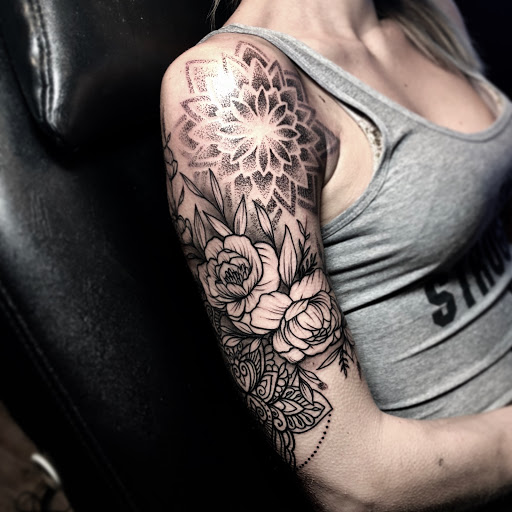 Explore cool sleeve tattoo ideas for guys, creative tattoo ideas in Peoria, available at InkCapital Tattoos
