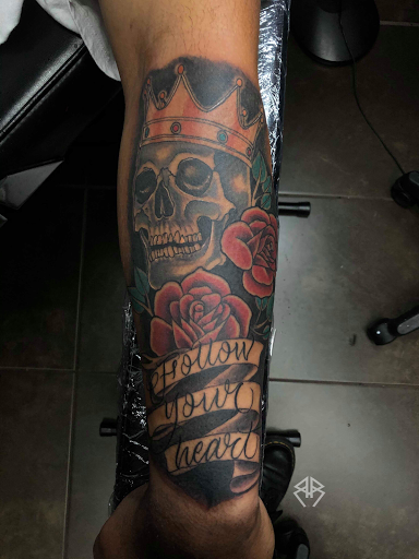 Explore mother son matching tattoo ideas, creative tattoo ideas in Cordova, available at The Rook x Raven Tattoo Creative