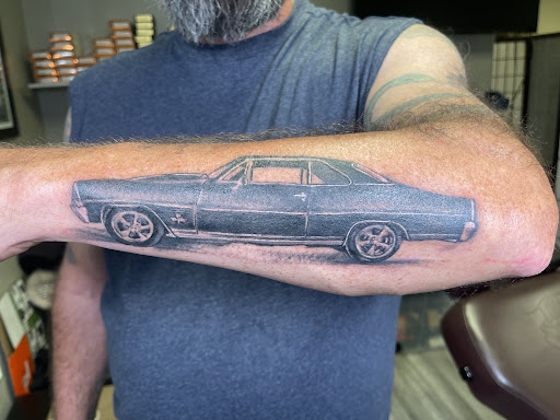 Find top of shoulder tattoo ideas for your next unique tattoo in Watford City at Soulful Ink Studios