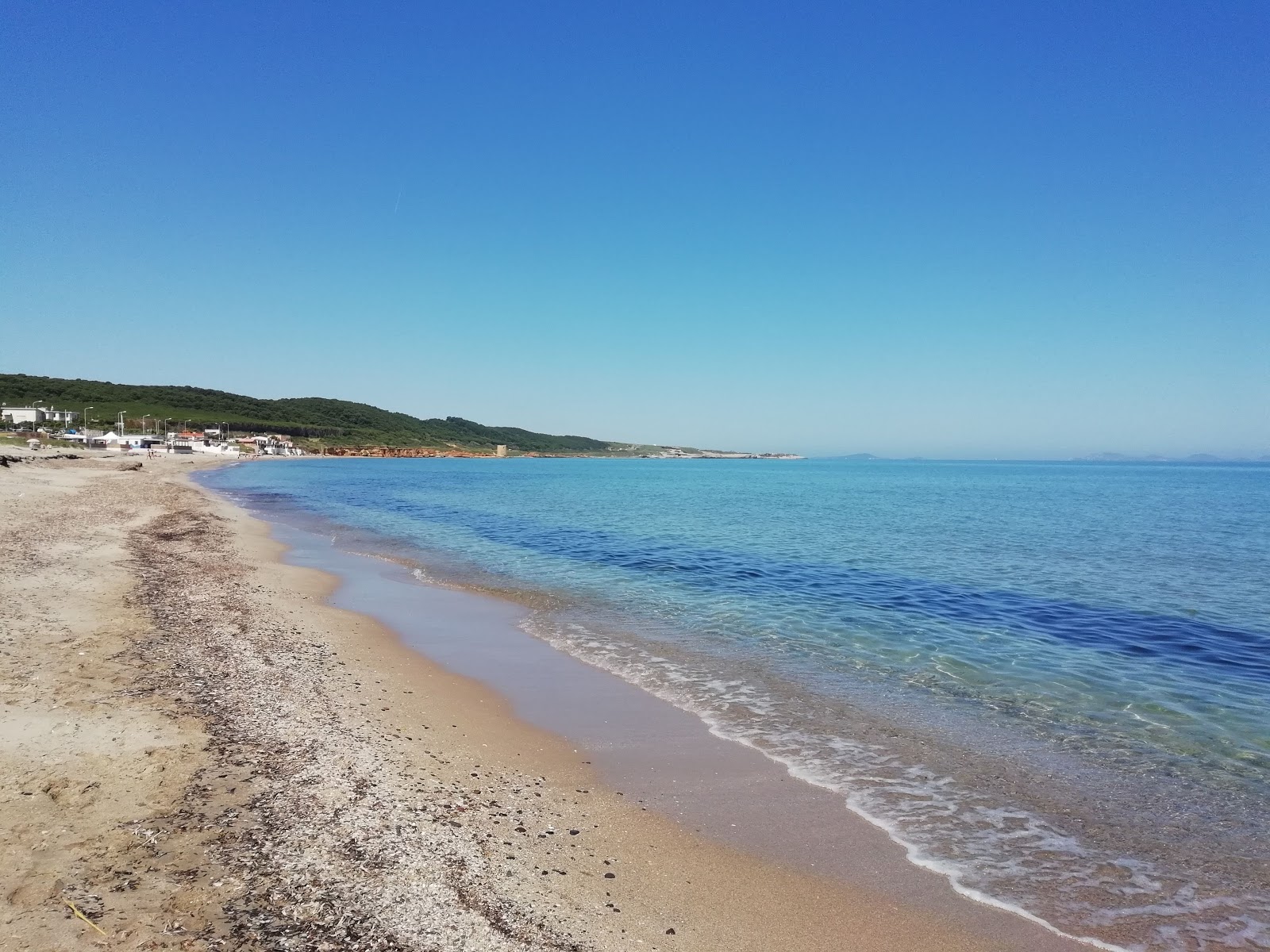 Platamona Plajı'in fotoğrafı - tatil için iyi evcil hayvan dostu nokta