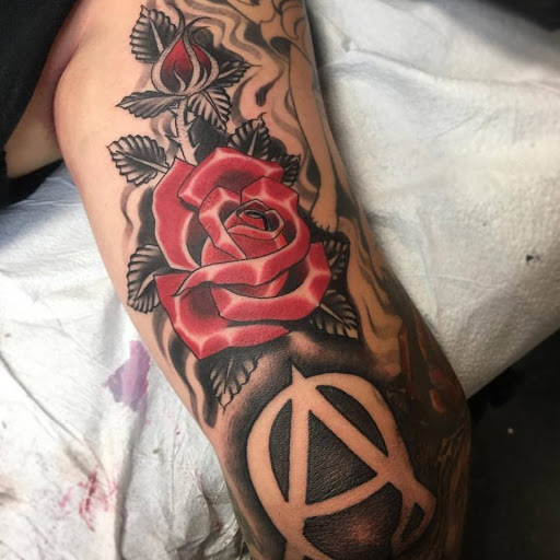 Explore small chicano tattoo ideas, creative tattoo ideas in Dunn, available at Heart and Hammer Tattoo Co.