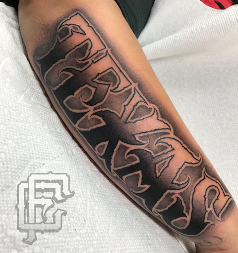 Explore tattoo cover up ideas for words, creative tattoo ideas in San Antonio, available at Firme Copias Tattoo Studio