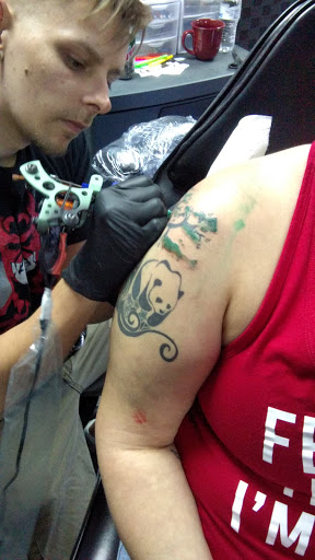 Explore dark tattoo ideas for women, creative tattoo ideas in Fayetteville, available at Evolution Ink Tattoo and Piercing Studio