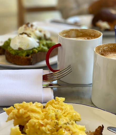 Pouched eggs on Avocado toast #cappuccino
