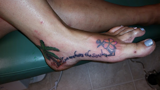 Explore collage tattoo ideas, creative tattoo ideas in Cumberland, available at Queen City Ink