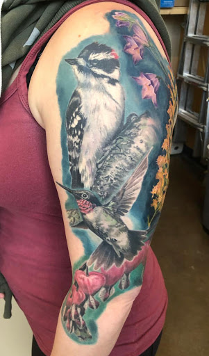 Explore male foot tattoo ideas, creative tattoo ideas in Lakeville, available at SharkTooth Tattoo & Gallery
