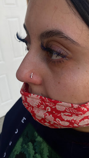 Explore rose tattoo ideas for females, creative tattoo ideas in Visalia, available at La Luna Piercings and Fine Jewelry