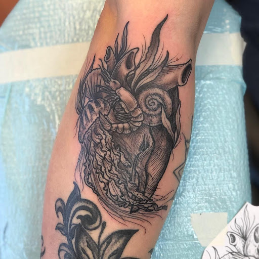 Explore golf tattoo ideas for men, creative tattoo ideas in Snohomish, available at Unknown Tattoo Co.