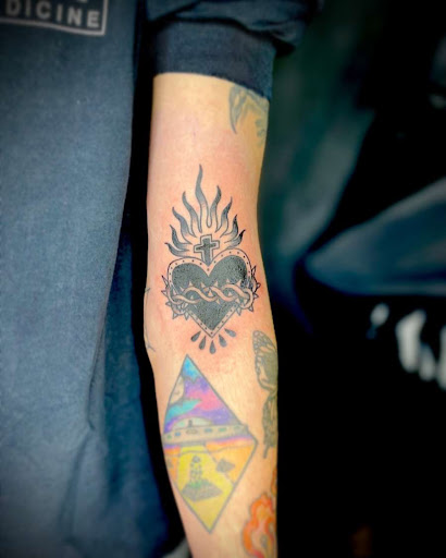 Explore cyber y2k tattoo ideas, creative tattoo ideas in Clarksville, available at Leap Then Look Tattoo