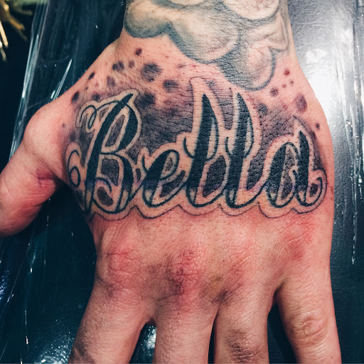 Explore back arm tattoo ideas for guys, creative tattoo ideas in Watertown, available at 623 Tattoo