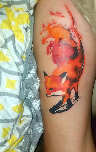 Explore flower ankle tattoo ideas, creative tattoo ideas in Summerville, available at Mystic Tiki Tattoo Studio & Gallery