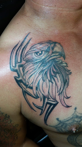 Tattoo Shop «Chicky Tattwo Tattoo Parlor», reviews and photos, 2001 W Main St, Leesburg, FL 34748, USA