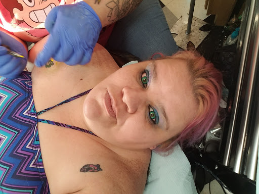 Tattoo Shop «Ink Slingers», reviews and photos, 1355 E Kearney St, Springfield, MO 65803, USA