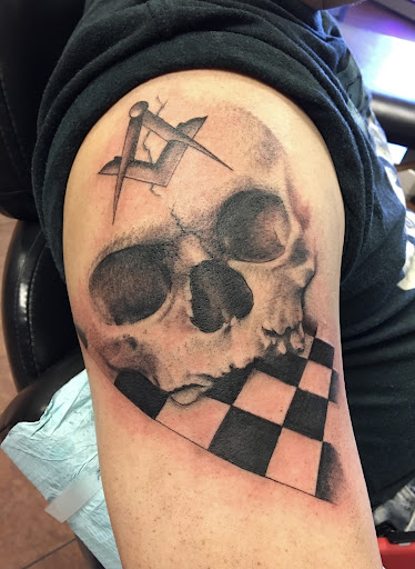 Explore spine tattoo ideas male, creative tattoo ideas in Osage Beach, available at Rabbits Foot Tattoo Parlor