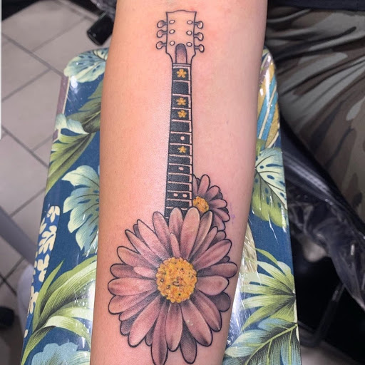 Explore pink panther tattoo ideas, creative tattoo ideas in Franklin Park, available at Atmosphere Tattoo Gallery - Franklin Park