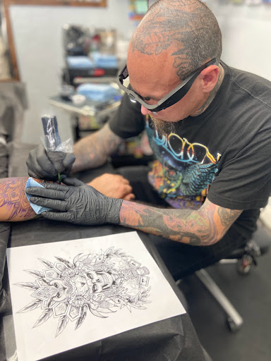 Explore cool cross tattoo ideas, creative tattoo ideas in San Diego, available at Funhouse Tattoo