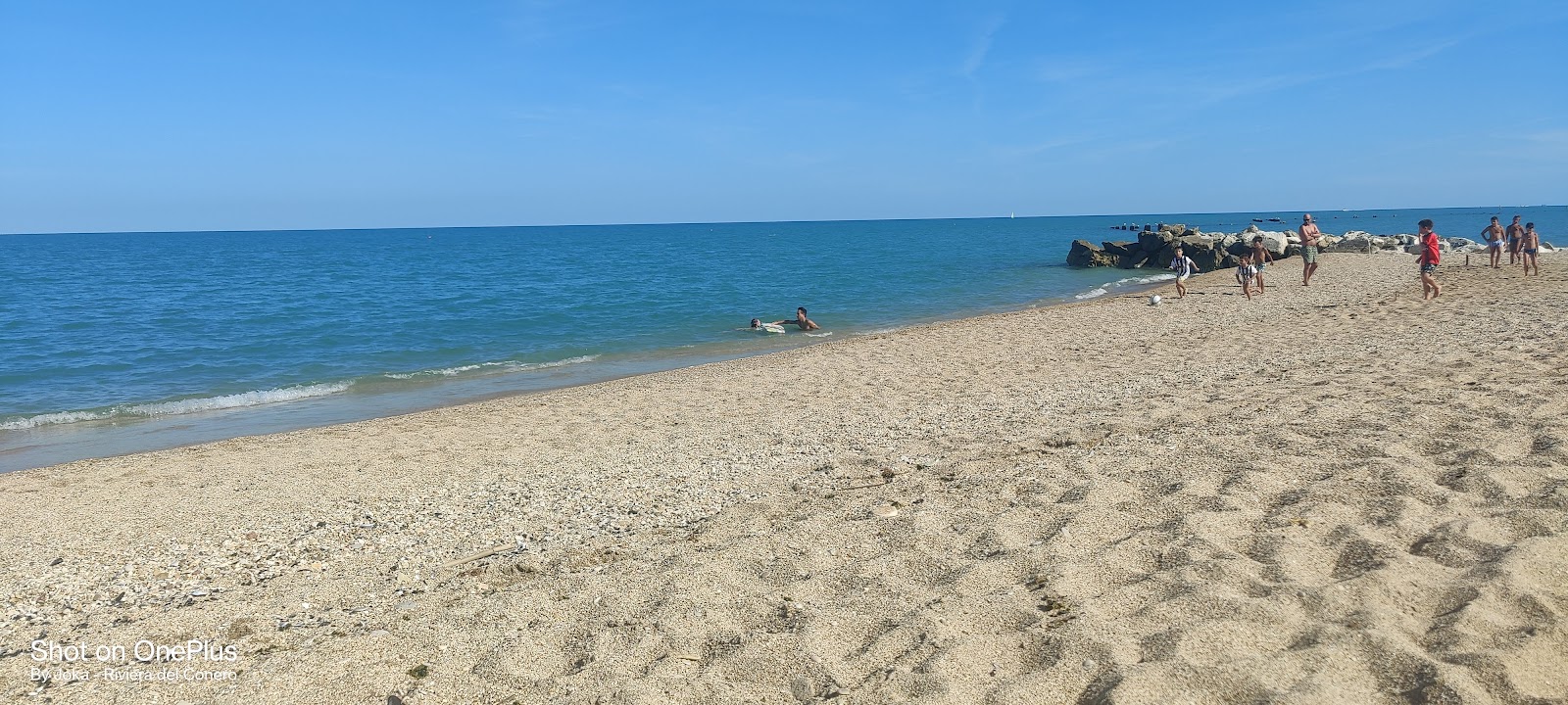 Valokuva Spiaggia dei Scossicciista. puhtaustasolla korkea