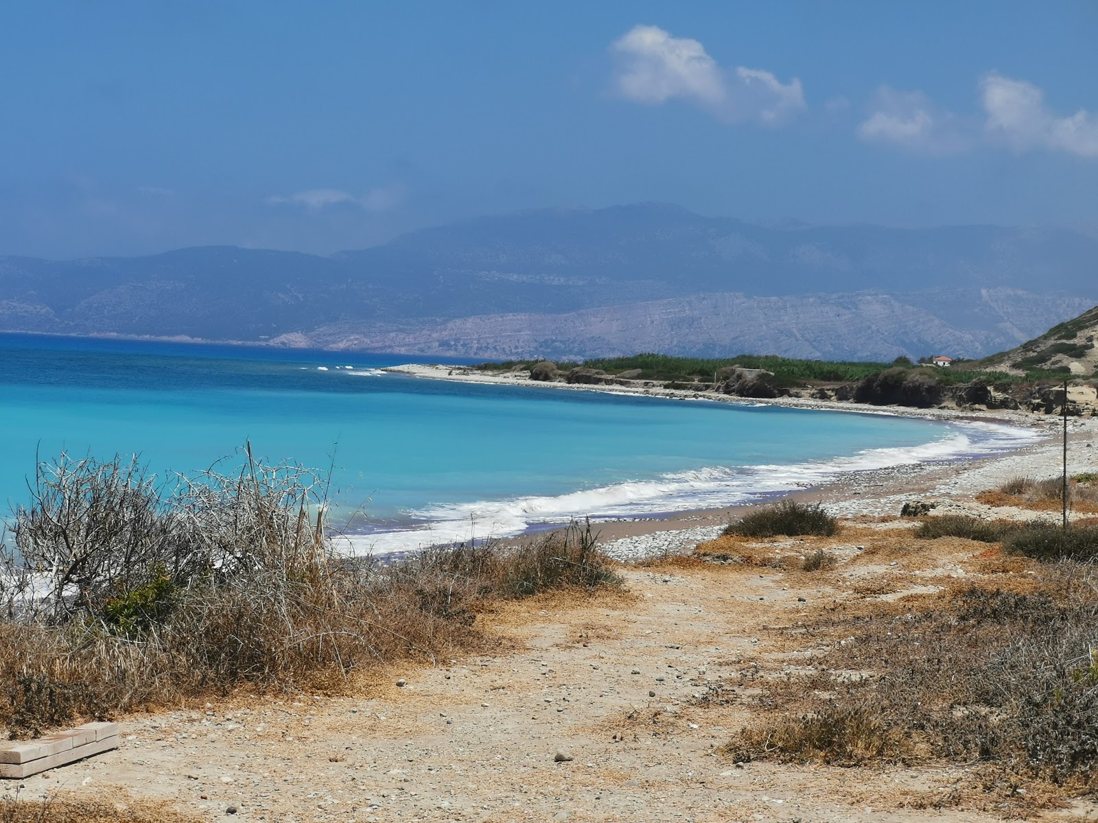 Kouloura Beach'in fotoğrafı çok temiz temizlik seviyesi ile