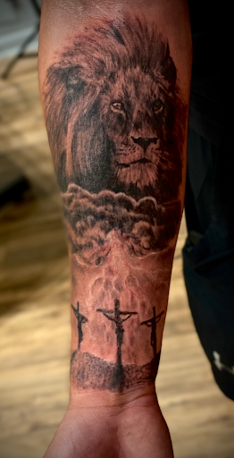 Explore thigh tattoo ideas for women, creative tattoo ideas in Brunswick, available at Brunswick Tattoo Company