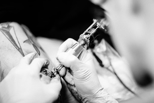 Explore dob tattoo ideas, creative tattoo ideas in Ann Arbor, available at Name Brand Tattoo