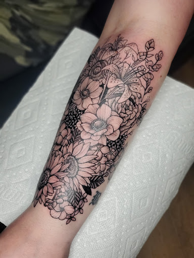 Find cardinal tattoo ideas for ladies for your next unique tattoo in Ronkonkoma at Velvet Tattoo Parlor LLC