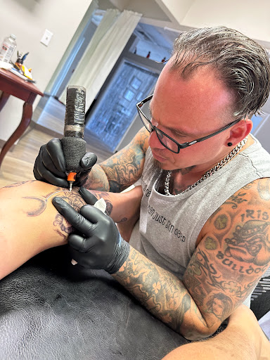 Explore men arm sleeve tattoo ideas, creative tattoo ideas in Kingsland, available at These Colors Dont Run Tattoo & Piercing