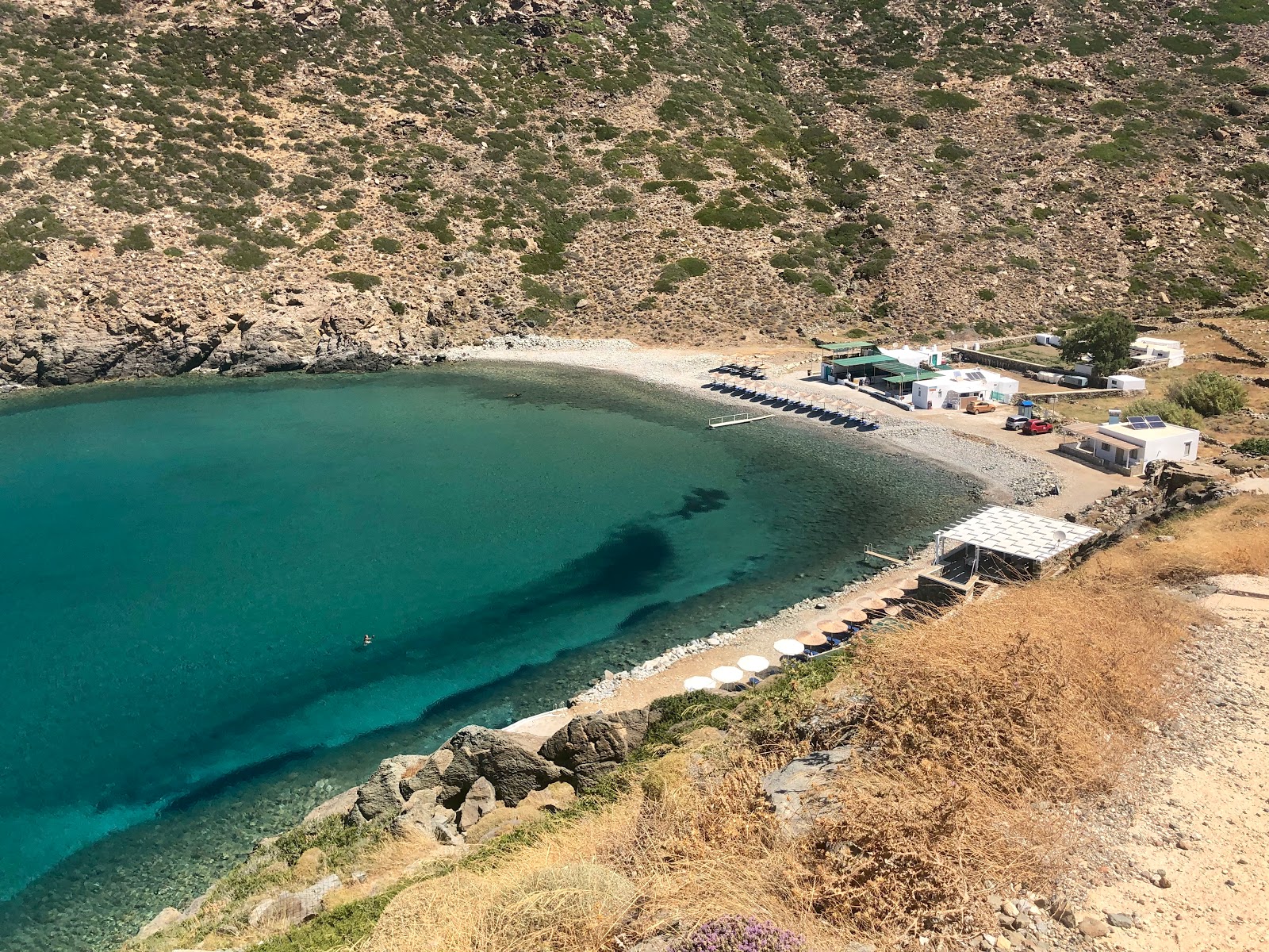 Photo of Vroulidia beach with gray pebble surface