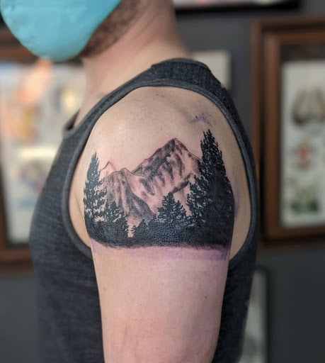 Explore spine tattoo cover up ideas, creative tattoo ideas in Milwaukee, available at Bay Street Tattoo Co.