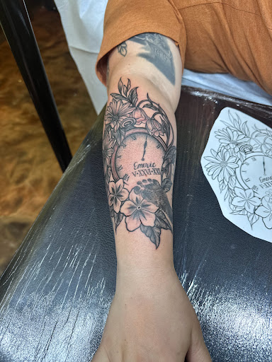 Explore hand tattoo ideas for females, creative tattoo ideas in Marietta, available at The Queen Bee Tattoo and Piercing Parlour