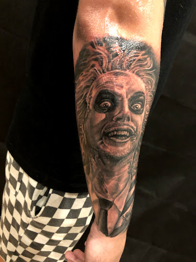 Explore father daughter matching tattoo ideas, creative tattoo ideas in Sarasota, available at SEVEN SINS Tattoo Studio