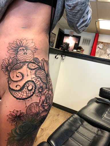 Explore tattoo ideas for mens thigh, creative tattoo ideas in Jefferson, available at Slammin Ink Tattoo