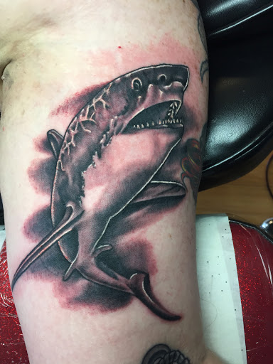 Explore face tattoo ideas, creative tattoo ideas in Liberty, available at Dark Lotus Tattoo & Salon