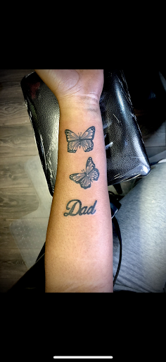 Explore tribal dragon tattoo ideas, creative tattoo ideas in Warrensburg, available at Altered Visions Tattoo Studio