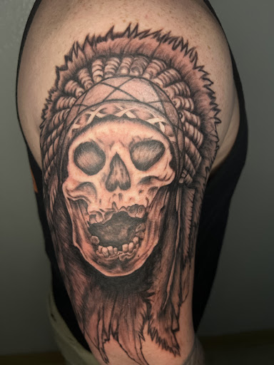 Explore tattoo ideas for my son's name, creative tattoo ideas in Orange, available at Top Floor Tattoo Studio