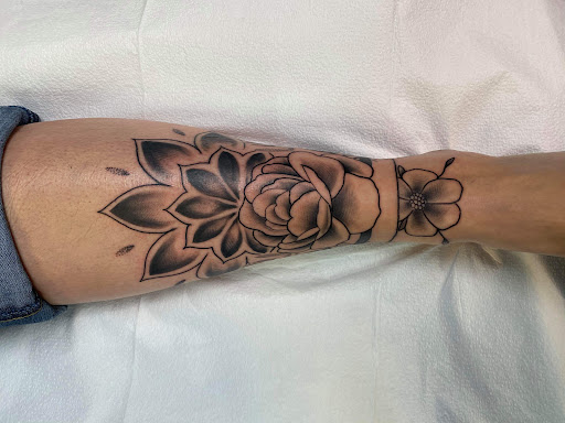 Explore singing tattoo ideas, creative tattoo ideas in Richland, available at The Green Room Tattoo Lounge