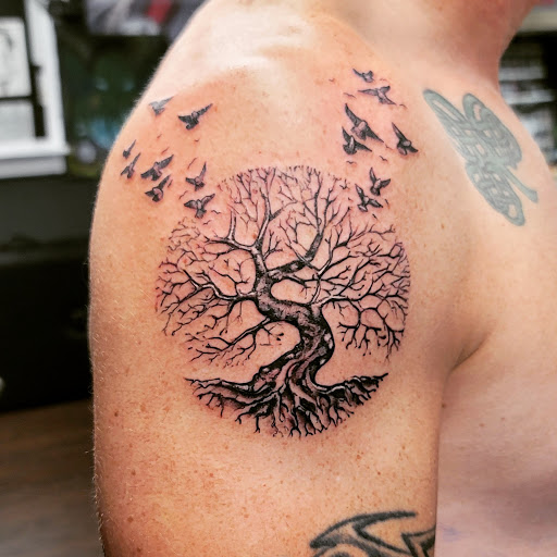 Explore tattoos ideas on back, creative tattoo ideas in East Windsor, available at AAA Tattoo