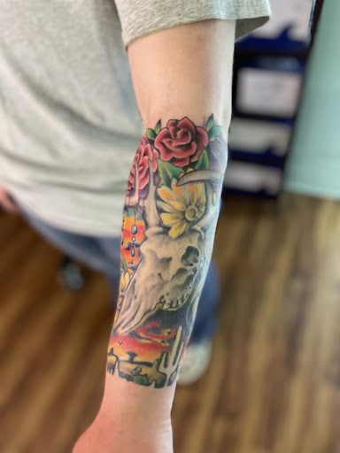 Explore wolf tattoo ideas for guys, creative tattoo ideas in Hayesville, available at Studio 1891 Ink & Art