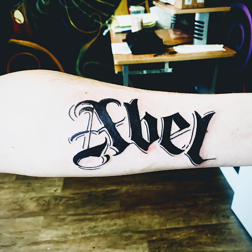 Explore skull forearm tattoo ideas, creative tattoo ideas in Lake City, available at Crooked Spines Tattoo Studio