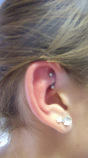 Explore flower vine tattoo ideas, creative tattoo ideas in Madison, available at Steves Tattoo & Body Piercing