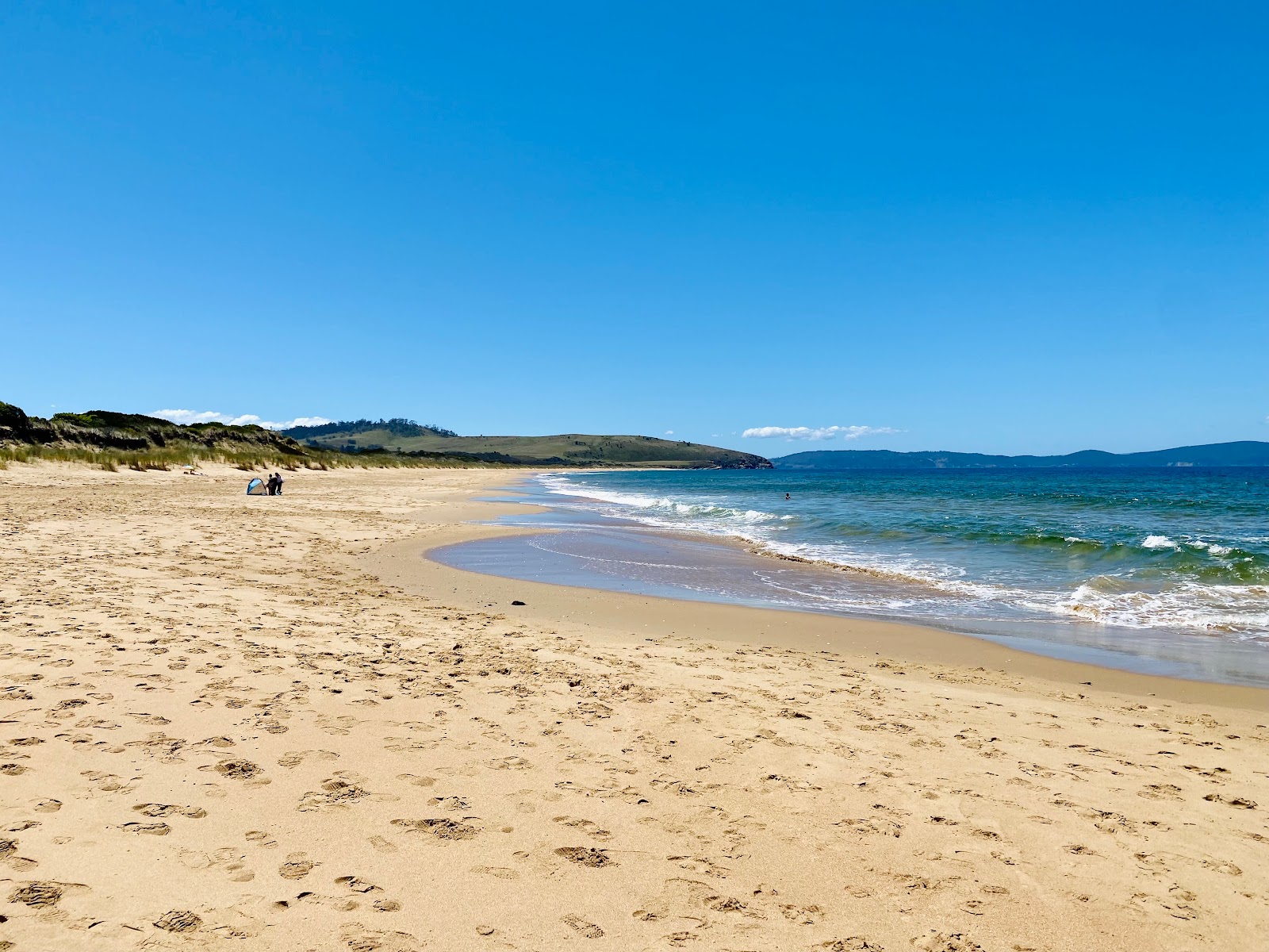 Foto de Goat's Beach com areia bege superfície