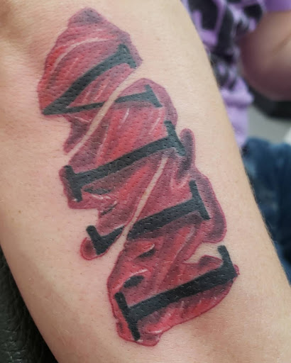 Explore gym tattoo ideas, creative tattoo ideas in Vinton, available at Cherry Bomb Tattoo and piercing