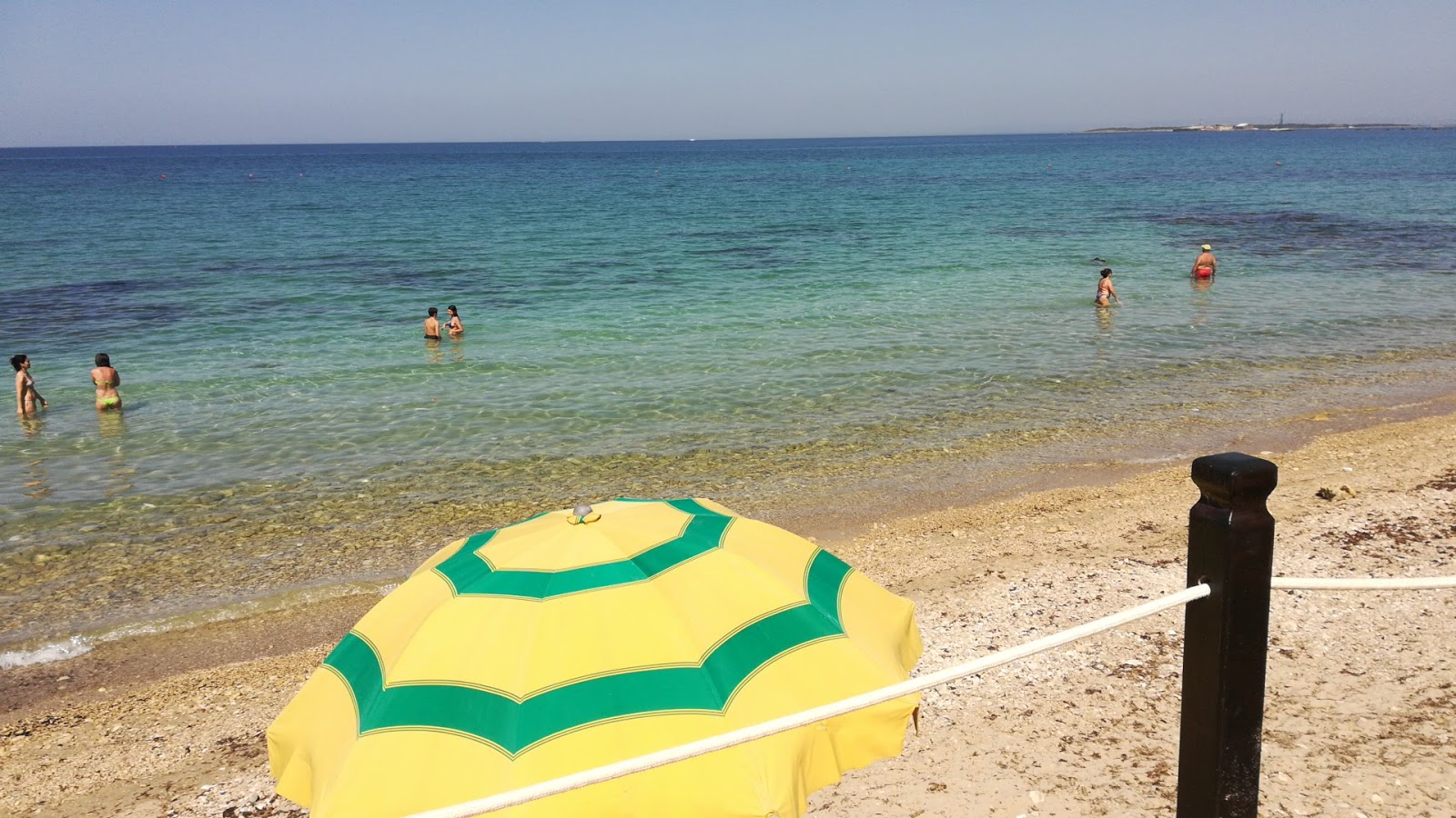 Fotografie cu Spiaggia Sottufficiali și așezarea