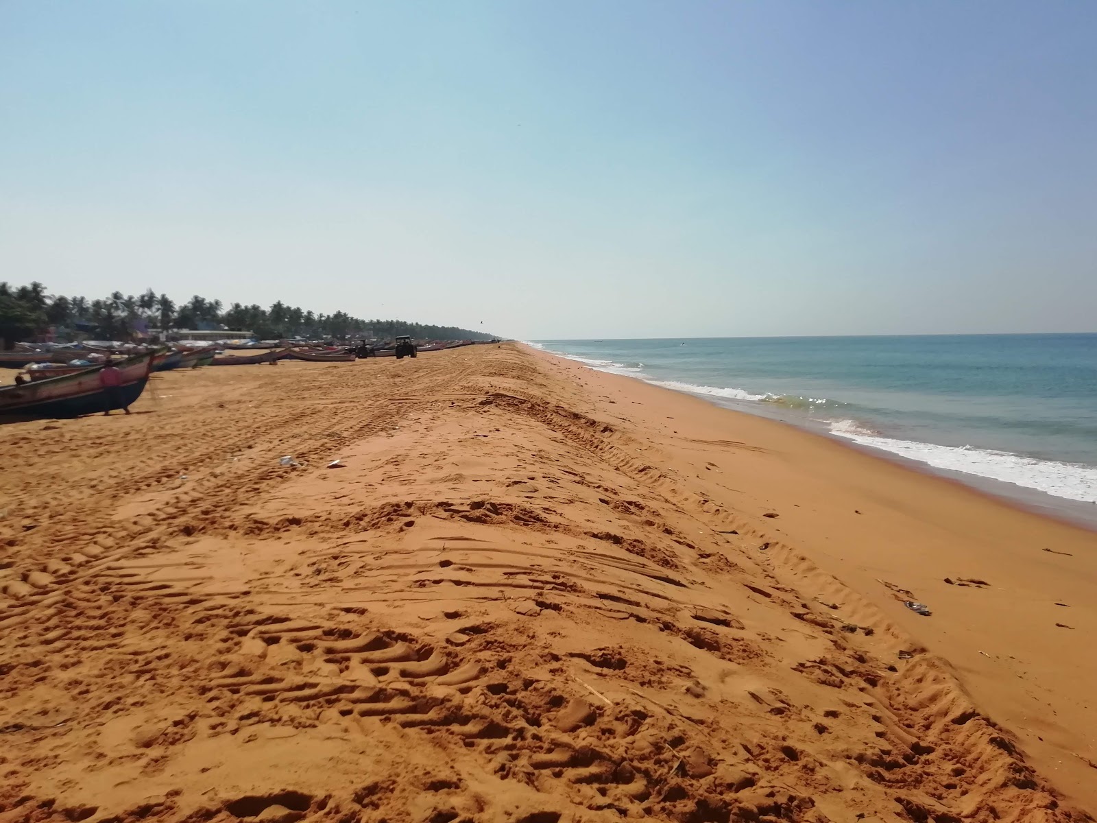 Foto av Gloria Beach med lång rak strand
