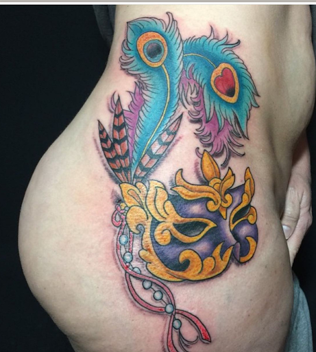 Explore female side tattoo ideas, creative tattoo ideas in New Orleans, available at Tattooagogo