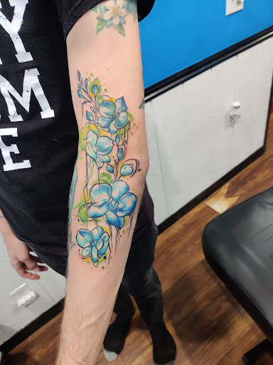Explore traditional elbow tattoo ideas, creative tattoo ideas in Logan, available at Sacred Embers Tattoo