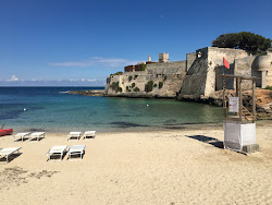 Spiaggia di Porto Ghiacciolo'in fotoğrafı - rahatlamayı sevenler arasında popüler bir yer